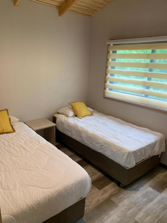 Cabanas Alto Bosque Пукон Екстер'єр фото